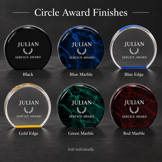 Six circular award finishes displayed on a dark background under the heading 'Circle Award Finishes.' The products are labeled Black, Blue Marble, Blue Edge, Gold Edge, Green Marble, and Red Marble, each with the text 'JULIAN SERVICE AWARD' on the front.