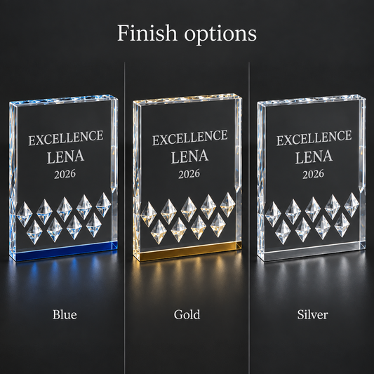 Three crystal award plaques labeled 'EXCELLENCE LENA 2026' on a dark background, shown side by side with finish options Blue, Gold, and Silver.