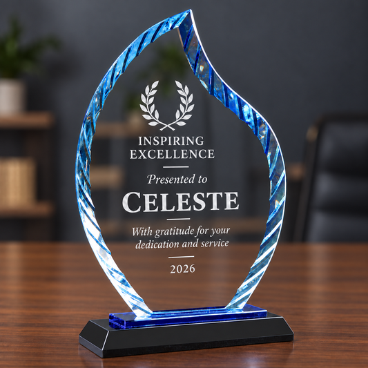 8-inch clear Flame glass award on blue reflective and black base with sample Celeste engraving
