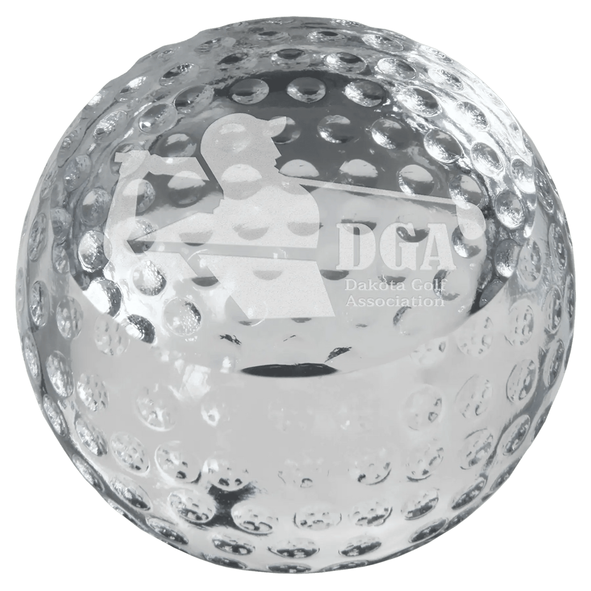 Clear crystal golf ball paperweight with textured dimples and etched DGA Dakota Golf Association logo, designed as a distinctive golf award or desk display piece