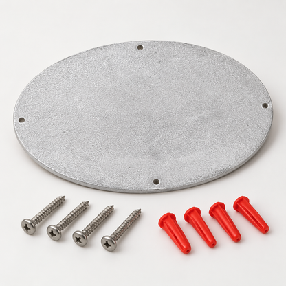 Back of oval cast aluminum wall sign with mounting holes, screws, and red wall anchors