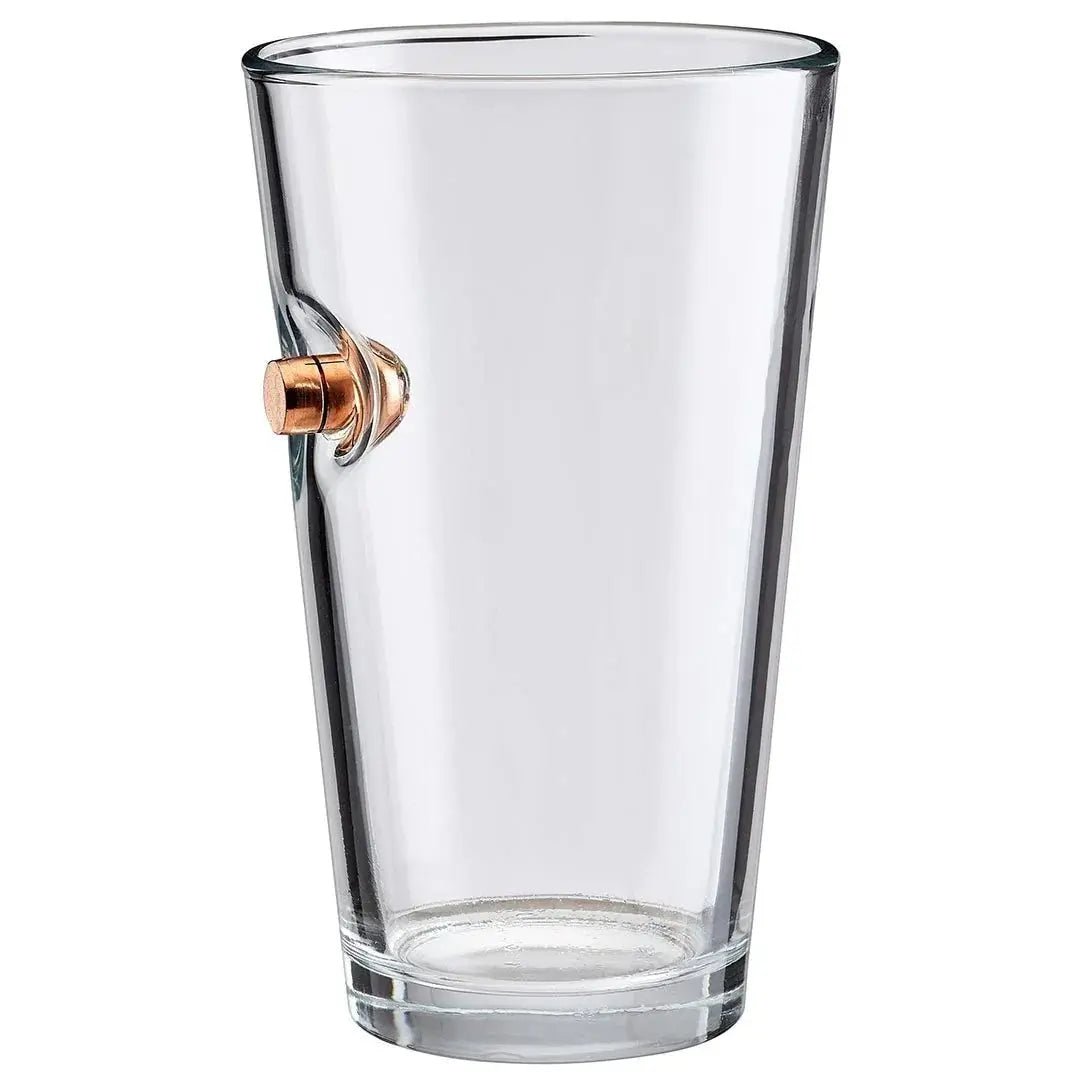 Clear glass with a bullet embedment on a white background.
