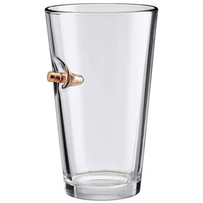 Clear glass with a bullet embedment on a white background