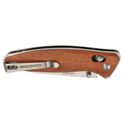 Wooden folding knife with metal components on a transparent background