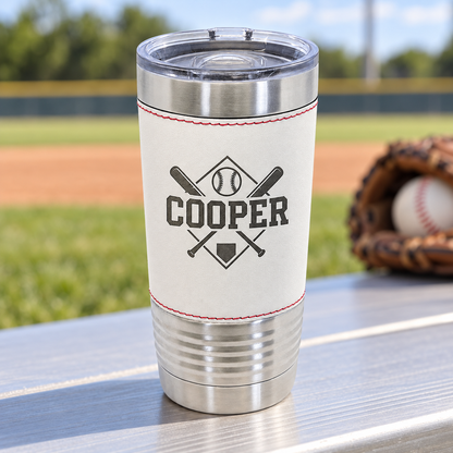 White baseball-style 20 oz tumbler with red stitching, black COOPER engraving and clear slider lid.