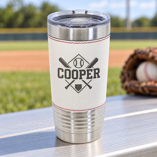 White baseball-style 20 oz tumbler with red stitching, black COOPER engraving and clear slider lid.