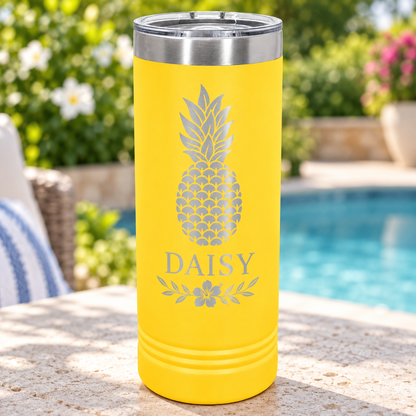 Yellow 22 oz skinny tumbler with silver DAISY pineapple engraving and clear slider lid.