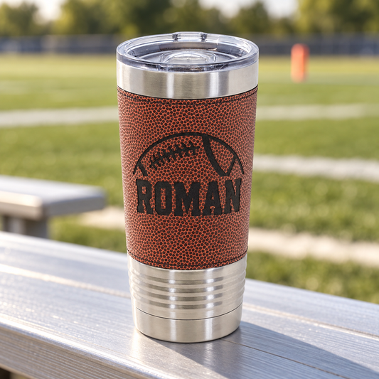 Brown textured football-style 20 oz tumbler with black ROMAN engraving and clear slider lid.