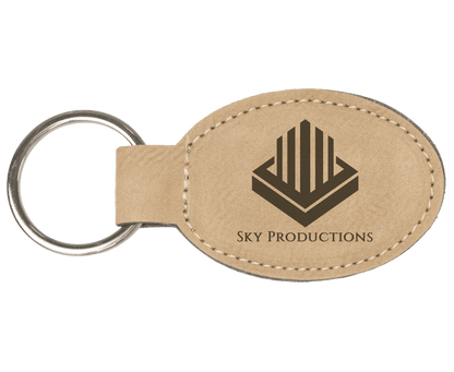 Light Brown personalized oval leatherette keychains with example engraving