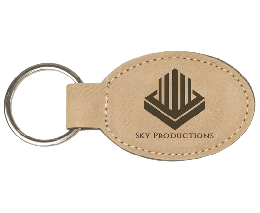 Light Brown personalized oval leatherette keychains with example engraving