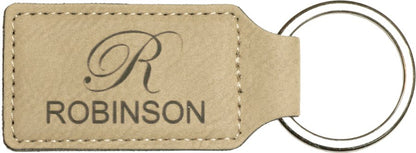 Light Brown personalized rectangle leatherette keychains with example engraving
