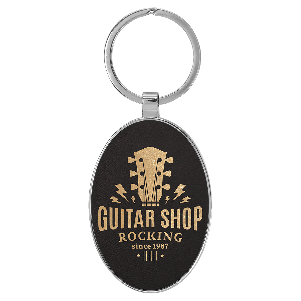 Black/Gold personalized metal-frame oval leatherette keychains with example engraving