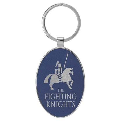 Blue/Silver personalized metal-frame oval leatherette keychains with example engraving
