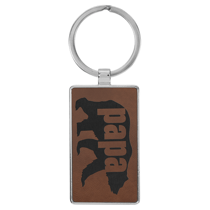 Dark Brown personalized metal-frame rectangle leatherette keychains with example engraving