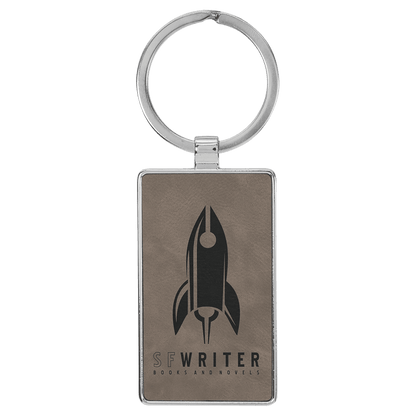 Gray personalized metal-frame rectangle leatherette keychains with example engraving