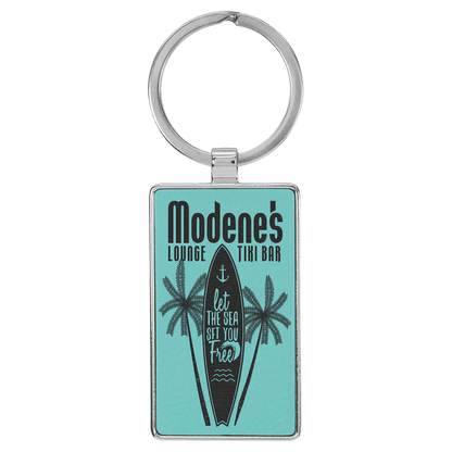 Teal personalized metal-frame rectangle leatherette keychains with example engraving