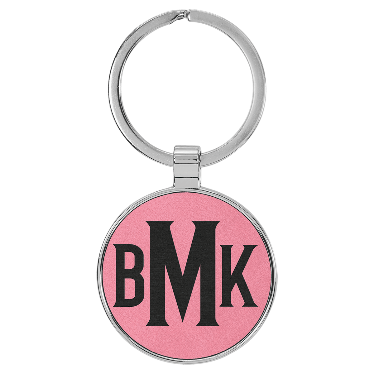 Pink personalized metal-frame round leatherette keychains with example engraving