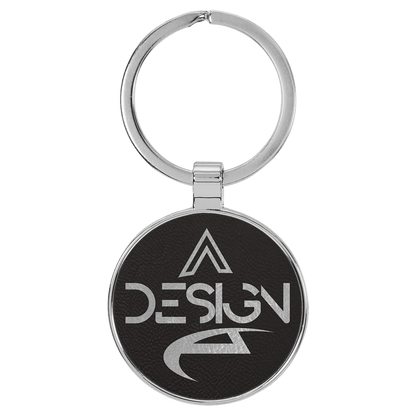 Black/Silver personalized metal-frame round leatherette keychains with example engraving