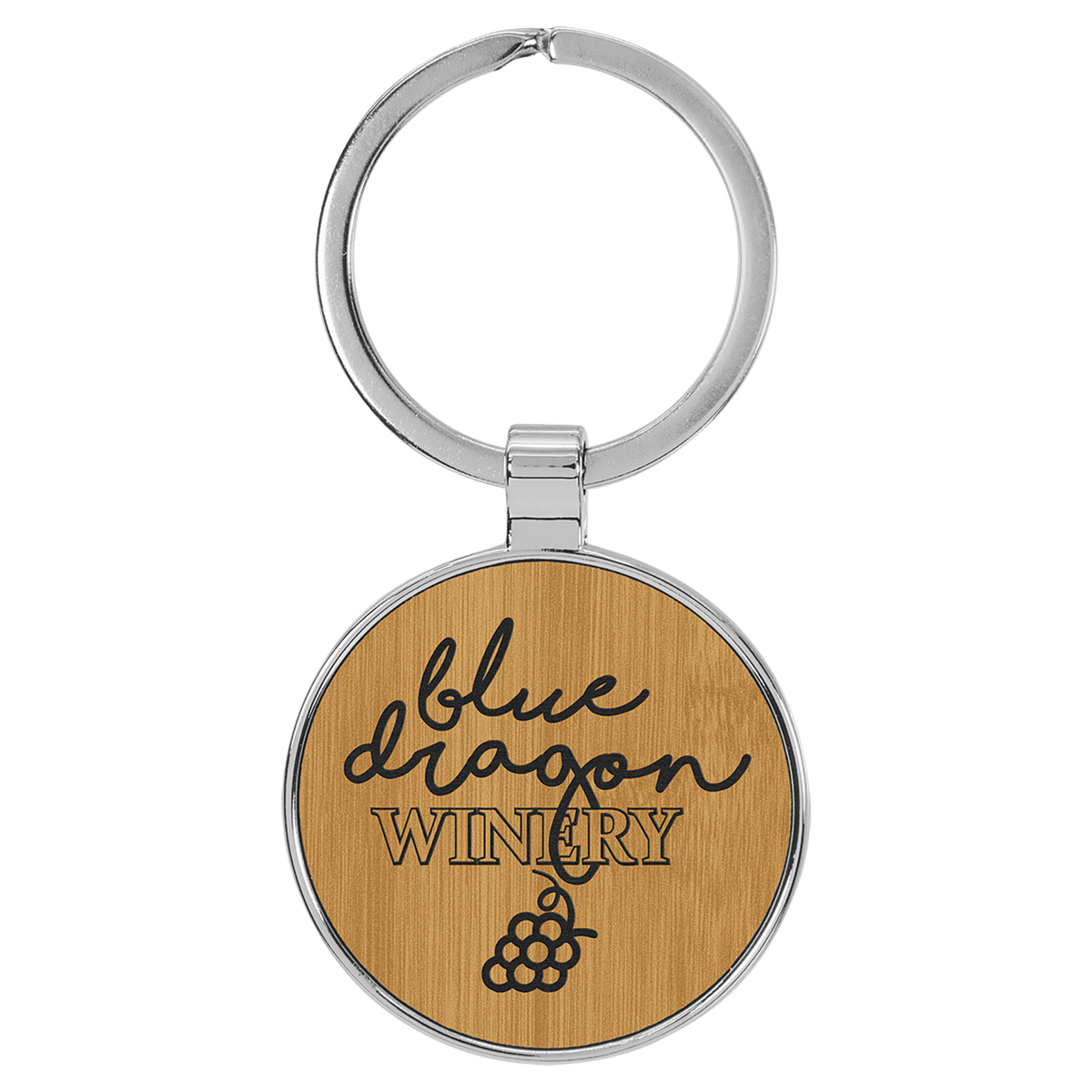 Bamboo personalized metal-frame round leatherette keychains with example engraving