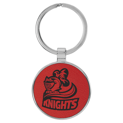 Red personalized metal-frame round leatherette keychains with example engraving