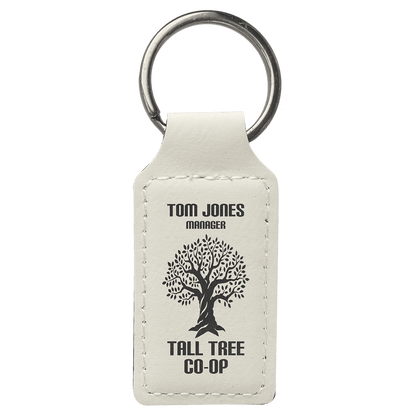 White personalized rectangle leatherette keychains with example engraving