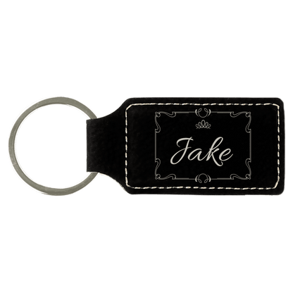 Black/Silver personalized rectangle leatherette keychains with example engraving