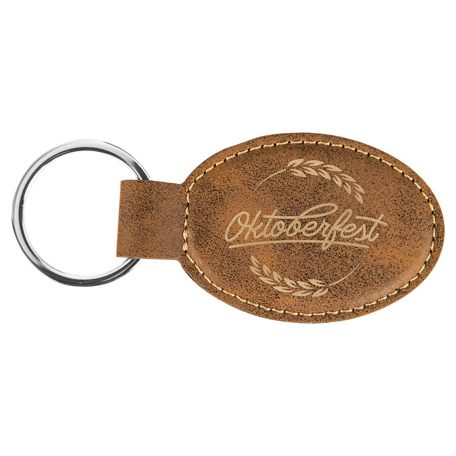 Rustic/Gold personalized oval leatherette keychains with example engraving