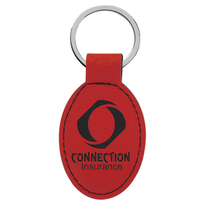Red personalized oval leatherette keychains with example engraving