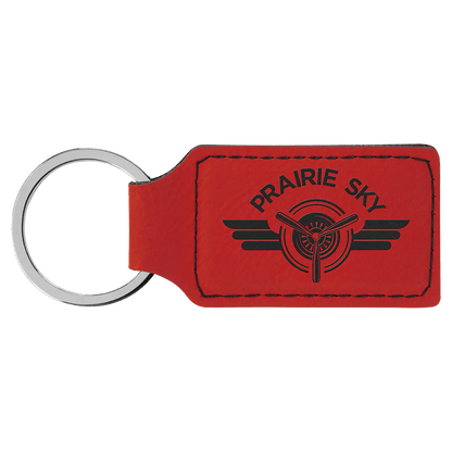 Red personalized rectangle leatherette keychains with example engraving