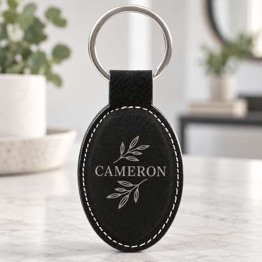 Black personalized Stitched oval keychains engraved CAMERON
