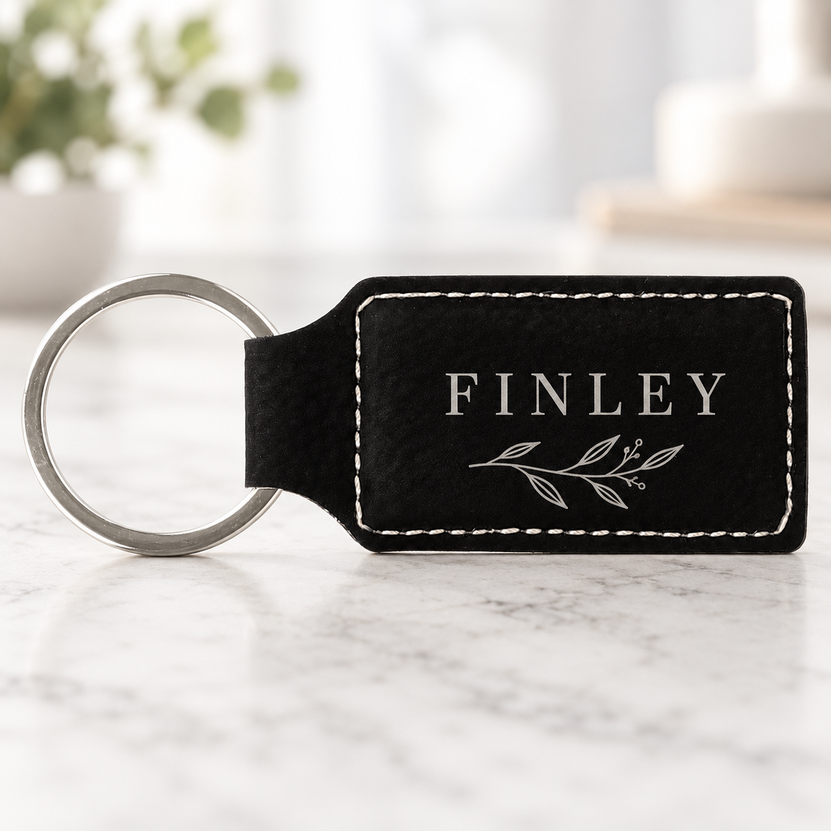 Black personalized Stitched rectangular keychains engraved FINLEY