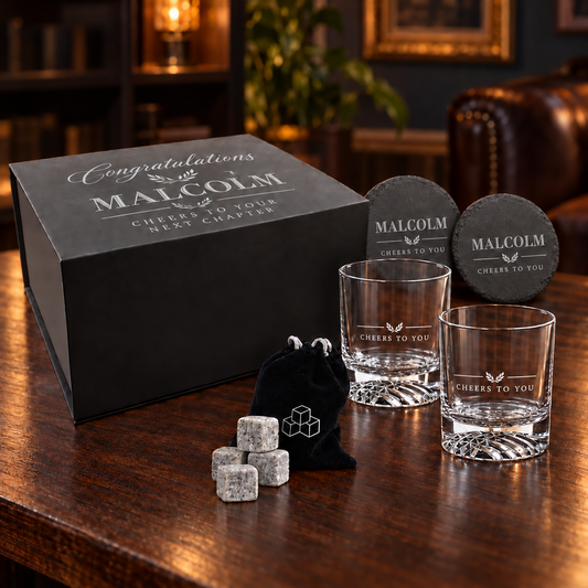 LazerBurst whiskey gift set with sample Malcolm engraving on the lid, glasses and slate coasters