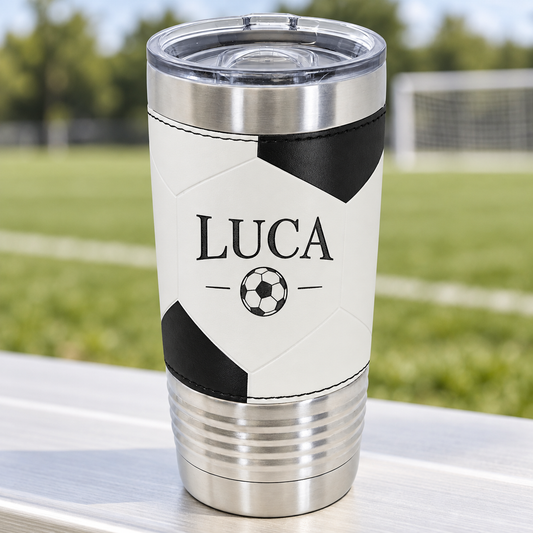 White and black soccer-style 20 oz tumbler with black LUCA engraving and clear slider lid.