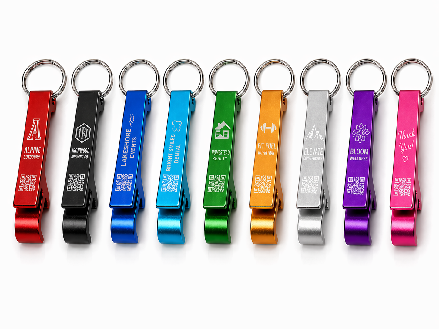 Row of colorful bottle openers with various designs and text on a white background