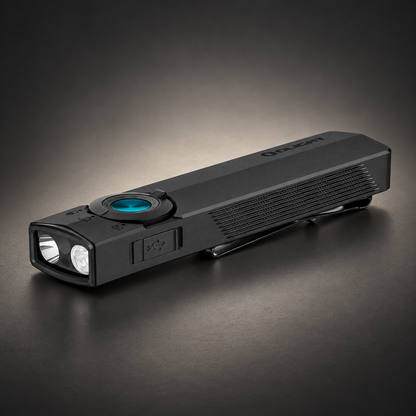 Olight black EDC flashlight with dual front lenses, blue control button, textured grip, and pocket clip shown on a dark surface