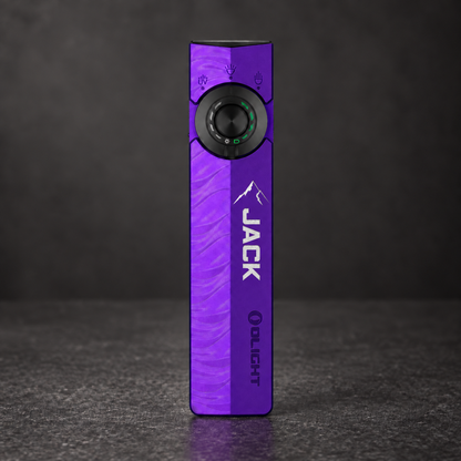 Purple Olight EDC flashlight standing upright on a dark surface, featuring a black circular control dial near the top and bold JACK branding on the front.