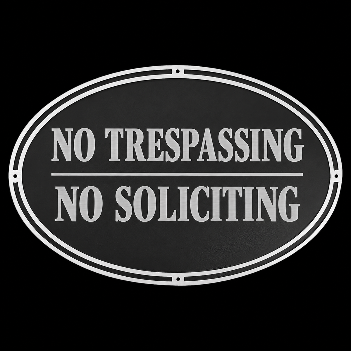 Black oval cast aluminum wall sign reading No Trespassing No Soliciting