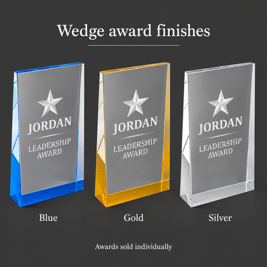 Three wedge-shaped acrylic award plaques on a dark gray background, labeled Blue, Gold, and Silver. Each plaque is engraved with a star and the text 'JORDAN LEADERSHIP AWARD.